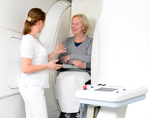 Claustrophobic women being shown the upright MRI scanner